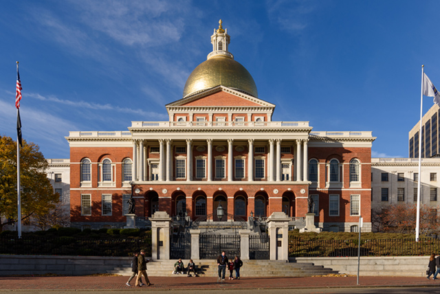 A drawing by a pre-k student of two hearts and a hand