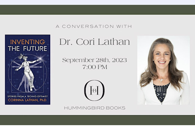 A drawing by a pre-k student of two hearts and a hand